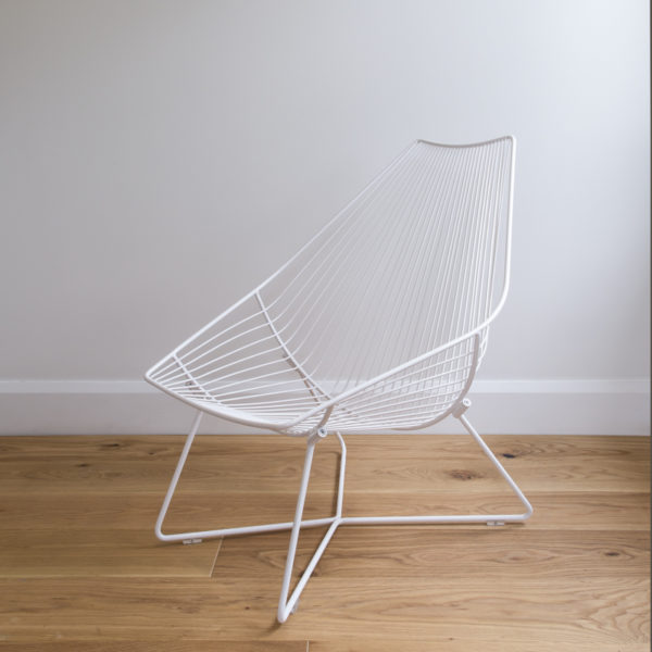 Outdoor chair, White wire lounger, mid century style with criss cross legs.