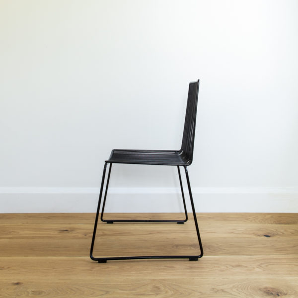 Side view of black metal wire dining chair. Outdoor wire furniture. Devonport chair by Ico Traders.