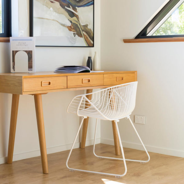 Wire furniture. Portobello Chair - a rounded white wire chair, sitting at an oak desk