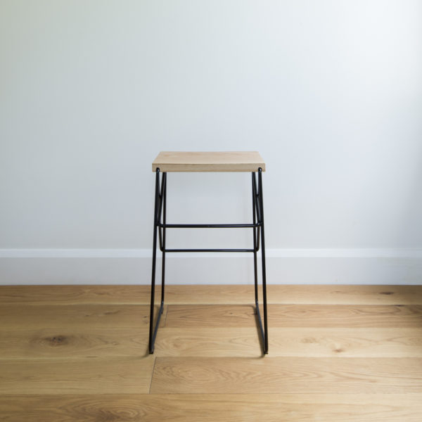 back view showing wire kitchen barstool with criss cross legs & solid oak seat