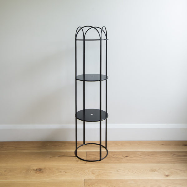 Round, three layered metal plant stand in colour black.