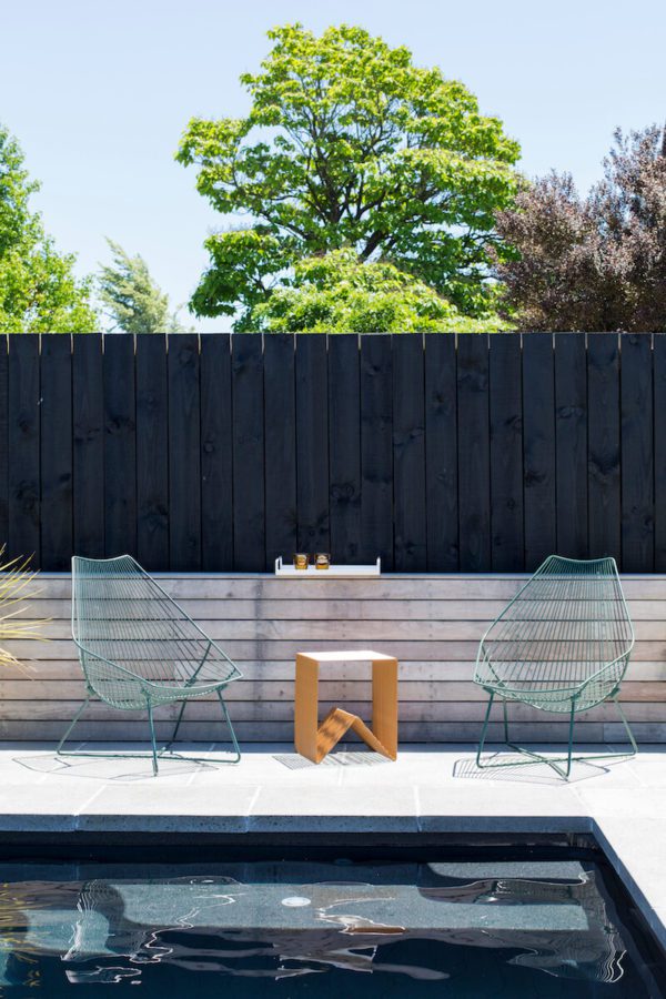 Outdoor wire chairs & table with a white metal tray.