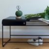 Solid metal plate sits on a black wire bench seat Benmore Bench seat & Benmore bench plate by Ico Traders