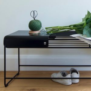 Solid metal plate sits on a black wire bench seat Benmore Bench seat & Benmore bench plate by Ico Traders