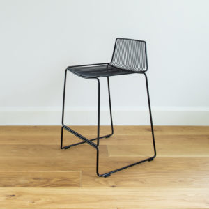 Stackable black wire barstool with a wire back. Dunedin barstool designed by Ico Traders