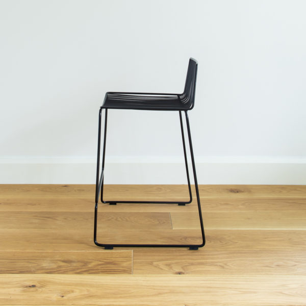 Black wire barstool with a backrest. Dunedin barstool by Ico Traders