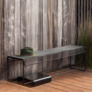 Stainless steel wire bench with minimalist design, styled indoors and outdoors with optional metal plate for added function.