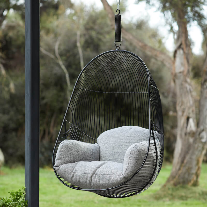 Big Puffy cushion seat sit inside the Hokianga hanging chair Elba an Italian woven boucle. Indoors and outdoors