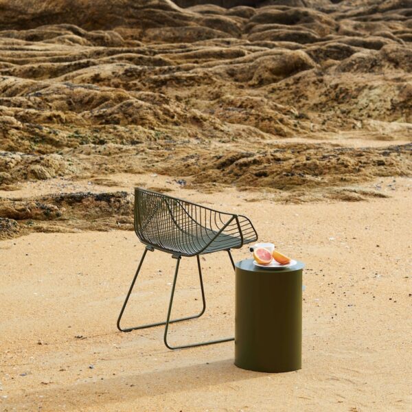 Stainless steel furniture verses mild steel furniture. Waipuna side table and the Portobello chair