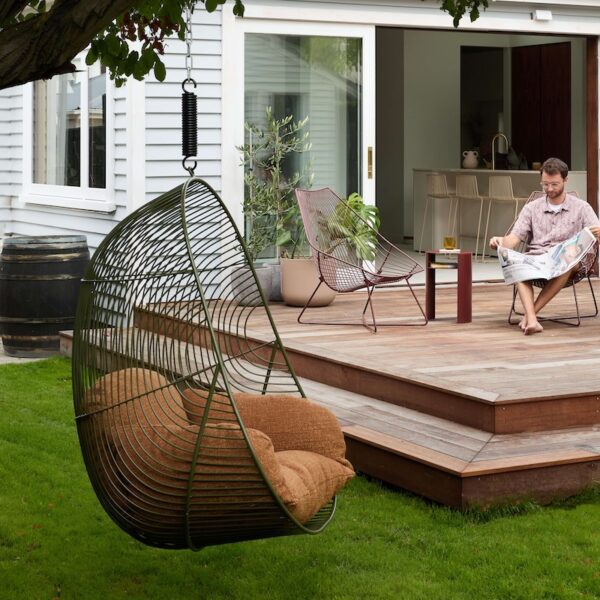 Handcrafted wire hanging chair in Green, designed for indoor and outdoor spaces