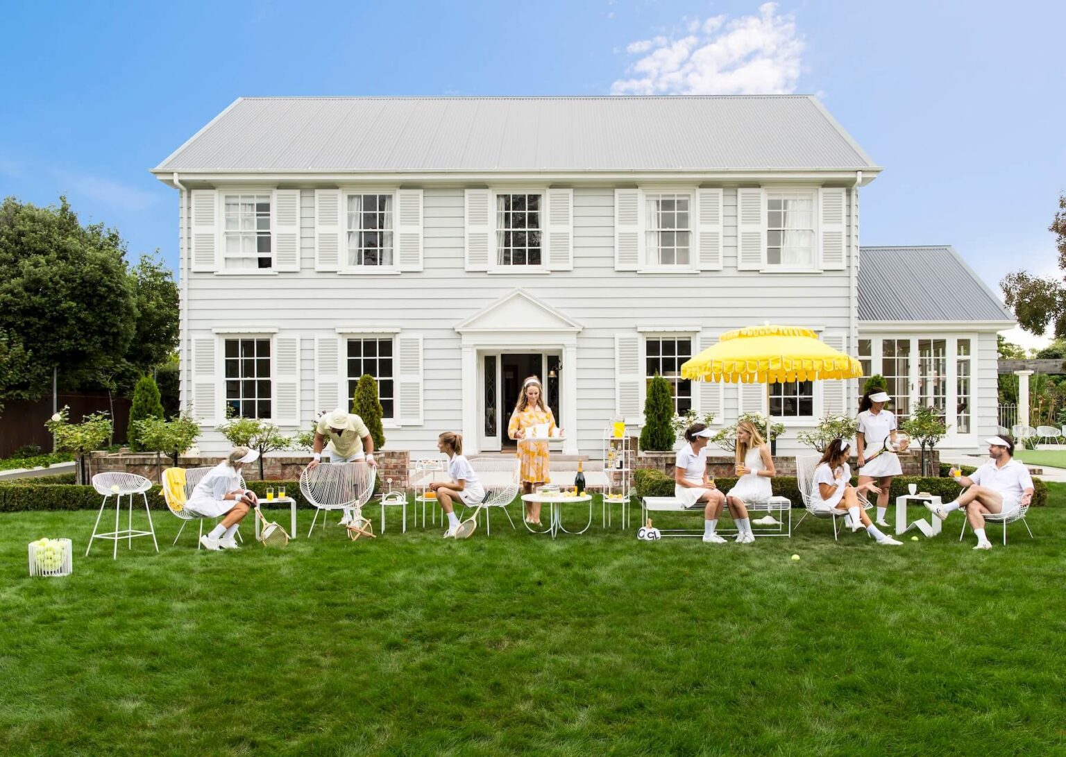 Outdoor wire furniture in Christchurch, New Zealand. Styled like Slim Arrons for Ico Traders Tennis party photo