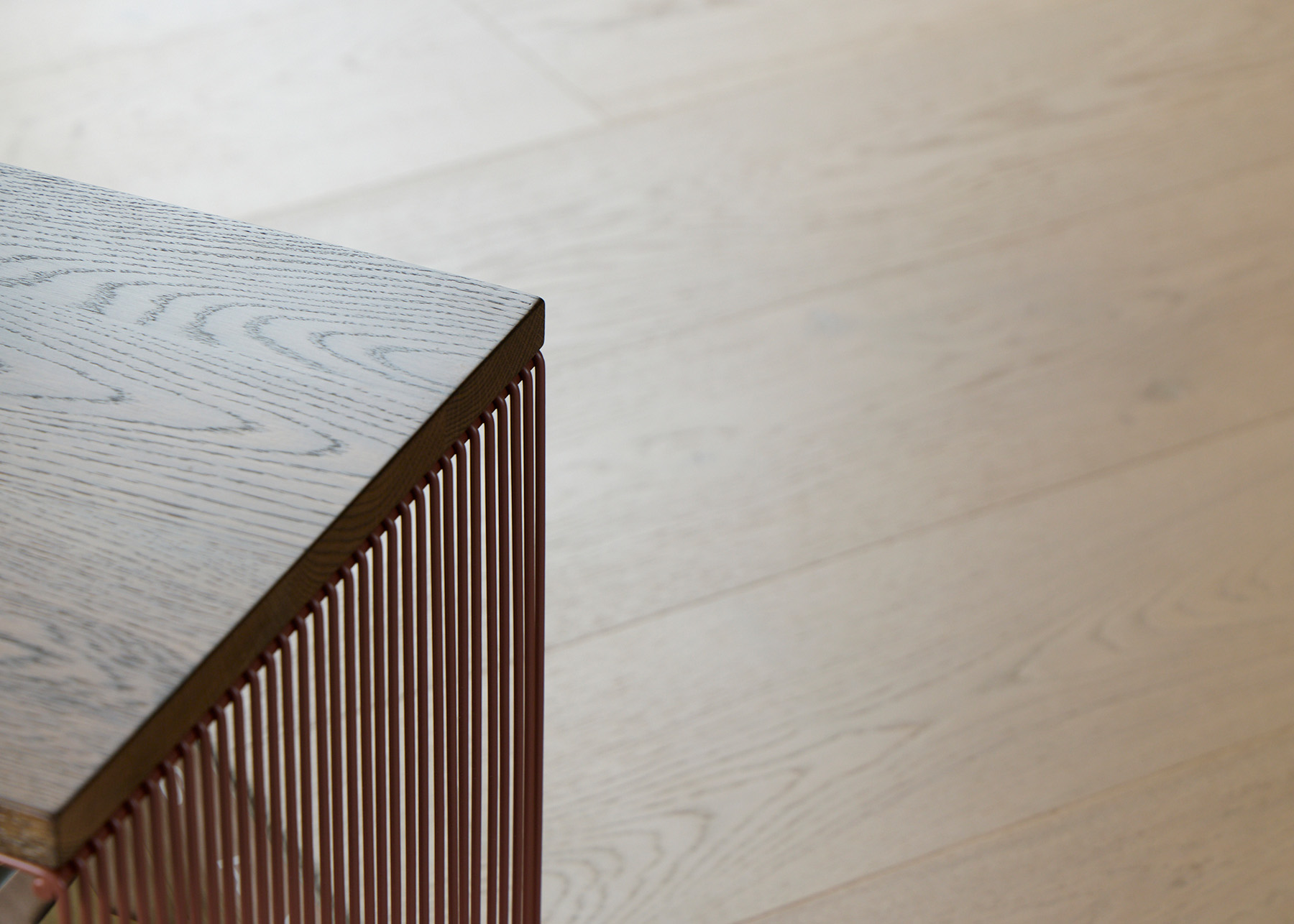 Willowby Walnut featuring a natural walnut stained oak top and powder-coated steel wire base.