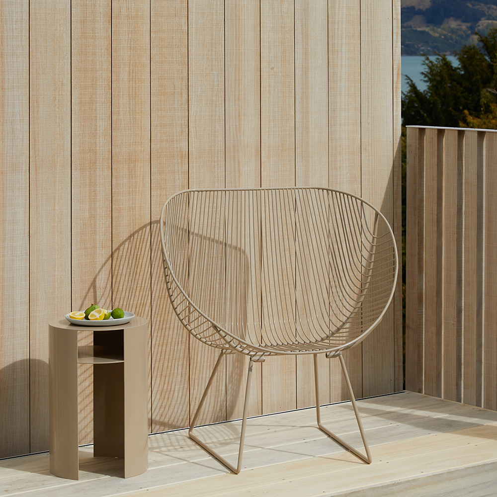 Ico Traders outdoor wire chair and side table in neutral tones, modern New Zealand furniture available through stockists and online